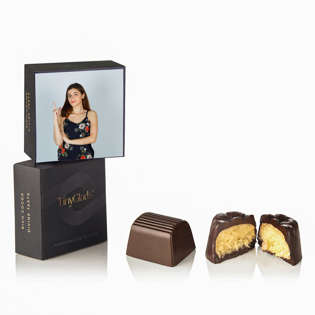 handcrafted chocolates in a decorated gift box.