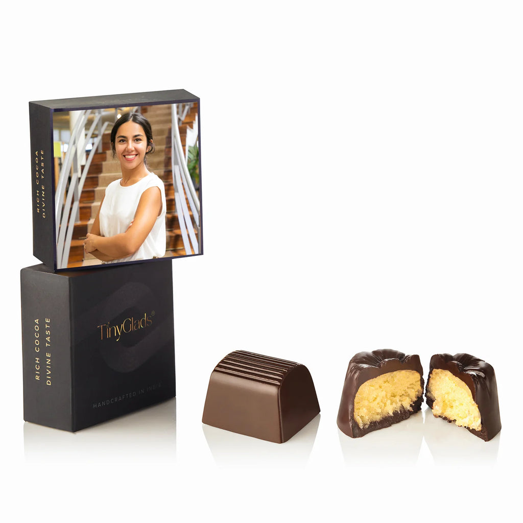 handcrafted chocolates in a decorated gift box.