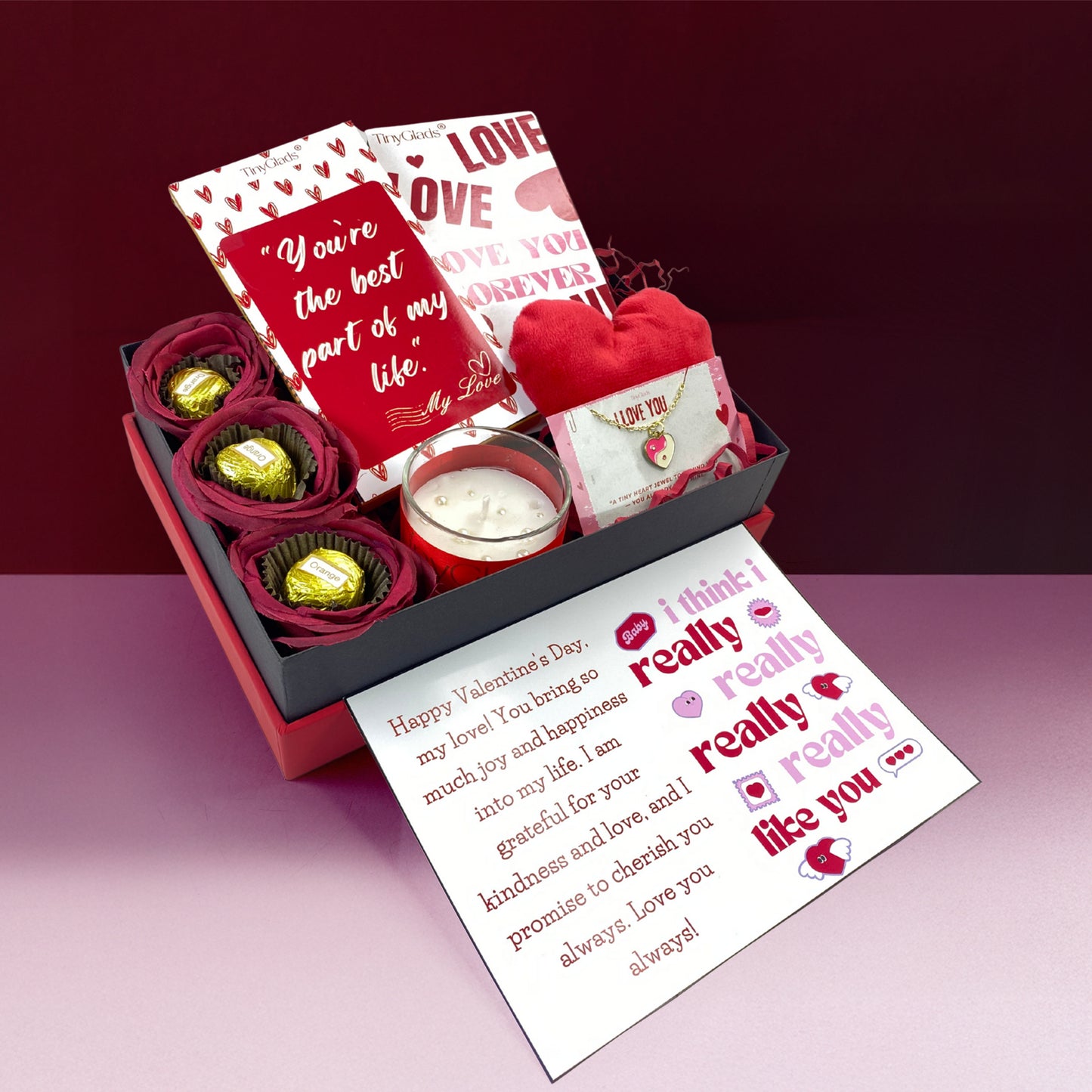 Valentine special gift box with truffle assortment, premium chocolate bars, soft toy, and candle