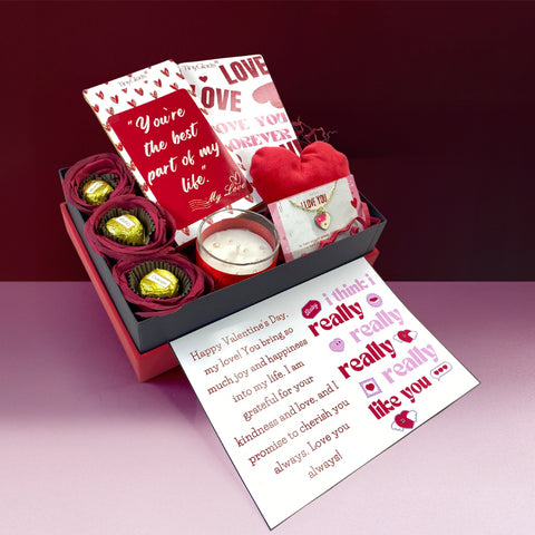 Valentine special gift box with truffle assortment, premium chocolate bars, soft toy, and candle